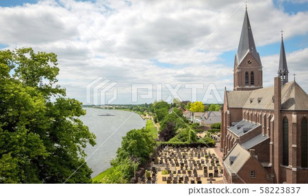 View over the Meuse to the castle keverberg and View over the Meuse to the castle keverberg and 58223837