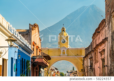 Arco de Santa Catalina and Volcan de Agua in Antigua Guatemala, Central America 58224357