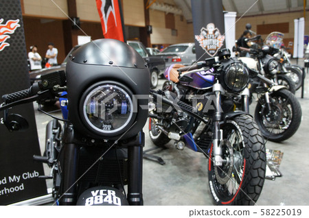 Modern motorcycle headlamps. Designed specifically to give enough vision for the rider. Installed at new displayed motorcycle inside the motorcycle showroom.  58225019