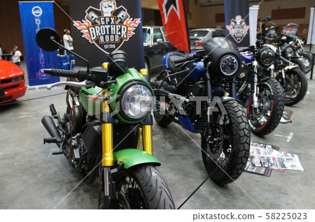 Modern motorcycle headlamps. Designed specifically to give enough vision for the rider. Installed at new displayed motorcycle inside the motorcycle showroom. Modern motorcycle headlamps. Designed specifically to give enough vision for the rider. Installed at new displayed motorcycle inside the motorcycle showroom. 58225023