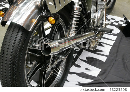 Selective focused of custom exhaust system at the motorcycle. Designed by 3rd party manufacturer to give different experience to the rider.  58225208