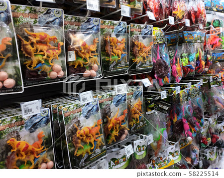 Children's toys are hung and exhibited to customers. Good design packaging. Sorted by type and labelled with a price. Children's toys are hung and exhibited to customers. Good design packaging. Sorted by type and labelled with a price. 58225514