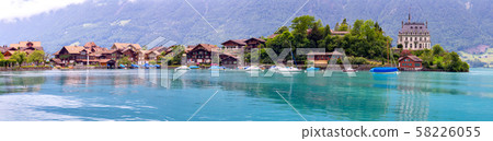 Panorama of the Swiss village of Iseltwald on the famous Lake Brienz. Switzerland. Panorama of the Swiss village of Iseltwald on the famous Lake Brienz. Switzerland. 58226055