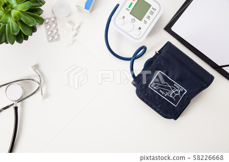Blood Pressure Machine With Stethoscope And Clipboard On White T 58226668