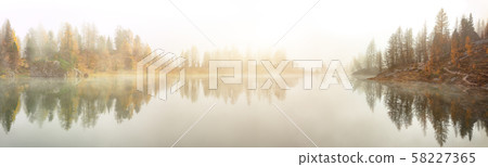 Dramatic foggy autumn landscape. View on Federa 58227365