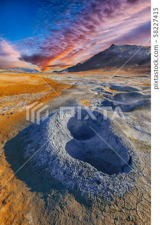 Boiling mudpots in the geothermal area Hverir and Boiling mudpots in the geothermal area Hverir and 58227415