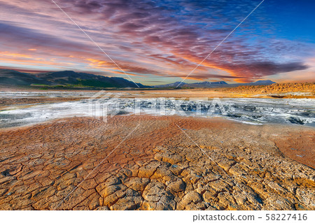 Boiling mudpots in the geothermal area Hverir and Boiling mudpots in the geothermal area Hverir and 58227416