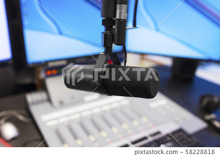 Microphone in modern radio station broadcasting studio 58228818