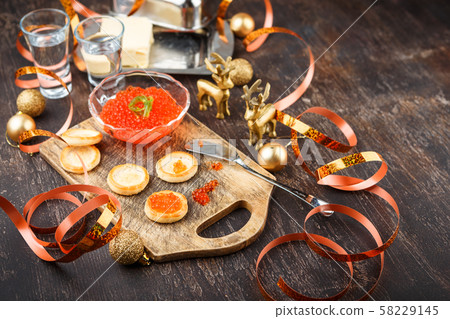 Canape with red salmon caviar 58229145