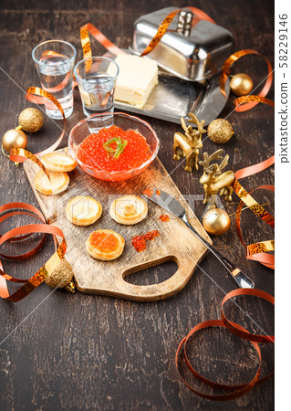 Canape with red salmon caviar 58229146