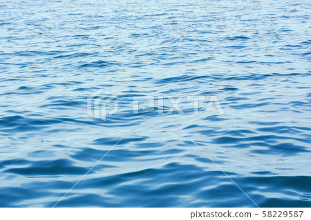 Surface of blue sea. 58229587