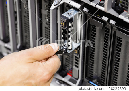 Engineer's Hand Working On Server At Data Center 58229893