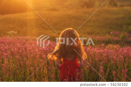 Dancing and jumping girl in red dress among Dancing and jumping girl in red dress among 58230102