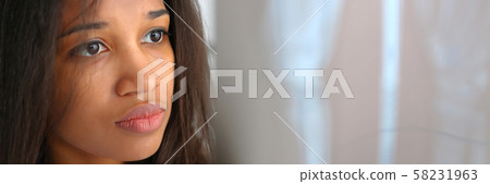 Female black doctor hold in arm and look Female black doctor hold in arm and look 58231963