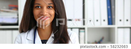 Beautiful smiling female doctor hold Beautiful smiling female doctor hold 58232083