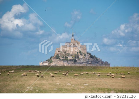 Mont Saint-Michel, a world heritage over sheep Mont Saint-Michel, a world heritage over sheep 58232120