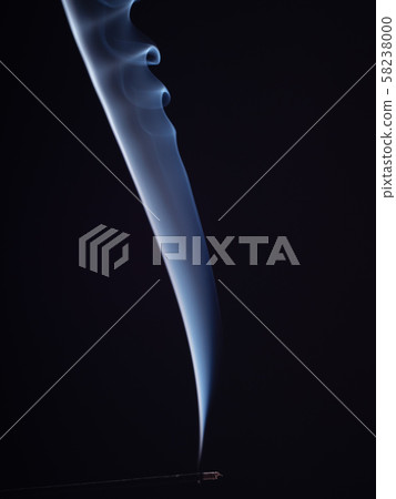 Steam of white smoke isolated on black background 58238000