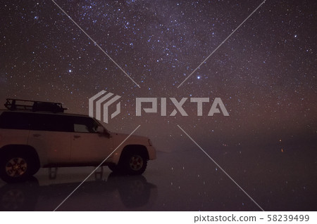 Uyuni salt lake night starry sky Milky Way superb view Uyuni salt lake night starry sky Milky Way superb view 58239499