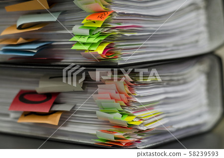 Extremely close up of the stacked office documents 58239593