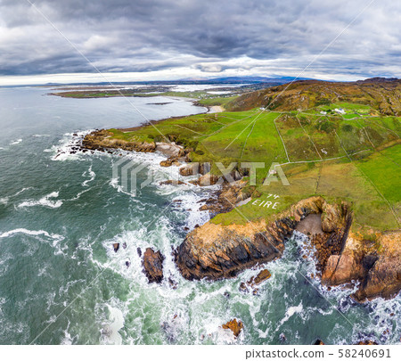 Aerial view of the Wild Atlantic Coastline by Maghery, Dungloe - County Donegal - Ireland. Aerial view of the Wild Atlantic Coastline by Maghery, Dungloe - County Donegal - Ireland. 58240691