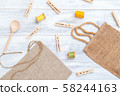 Zero waste. Fabric bag on white wooden background 58244163