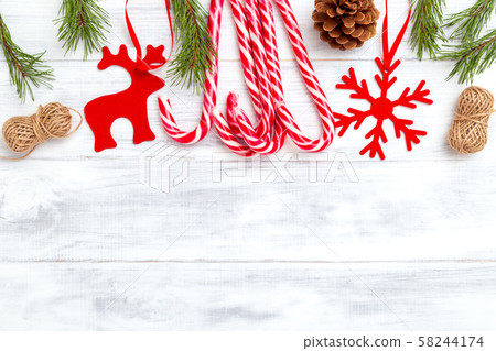 Christmas composition. Christmas decoration on wooden background. Copy space Christmas composition. Christmas decoration on wooden background. Copy space 58244174
