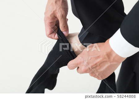 Office worker wearing socks 58244808
