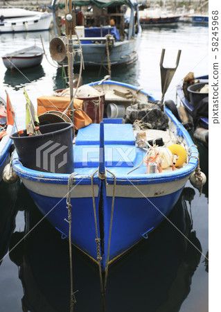 Old fishing boat with tackle in Italy Old fishing boat with tackle in Italy 58245968