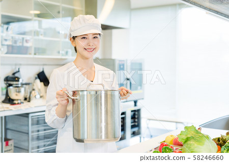 Lunch center kitchen female cook Lunch center kitchen female cook 58246660