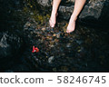 Toddler cooling in the river 58246745