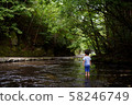 Children playing in the valley 58246749