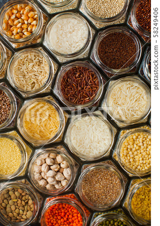 Food pattern background - beans and cereals in jars Food pattern background - beans and cereals in jars 58249406