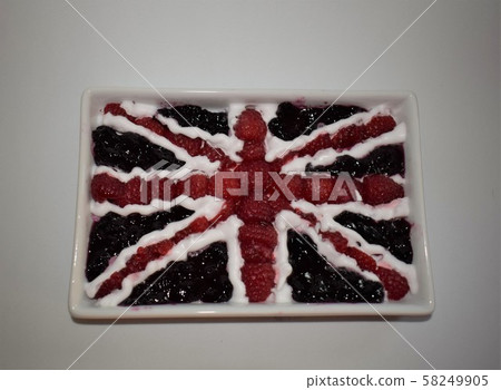 Flag of Great Britain made with raspberries, blueberry jam and Chantilli cream. Flag of Great Britain made with raspberries, blueberry jam and Chantilli cream. 58249905
