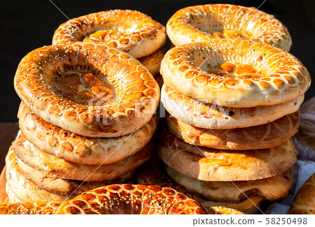 Appetizing uzbek flat breads from the tandir Appetizing uzbek flat breads from the tandir 58250498