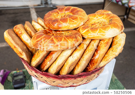 Appetizing uzbek flat breads from the tandir Appetizing uzbek flat breads from the tandir 58250506