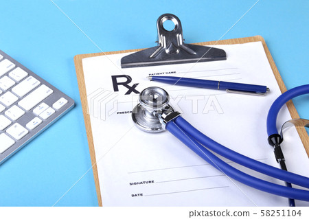 Medical stethoscope lying on cardiogram chart closeup. Medical help, prophylaxis, disease prevention 58251104