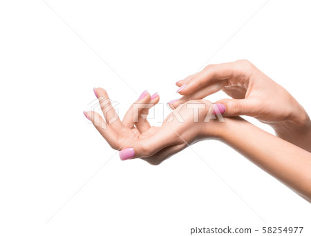 Female hands close up. Applying cream. Female hands close up. Applying cream. 58254977