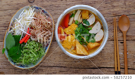 bowl of homemade vegan rieu noodle soup or vegetarian crab paste vermicelli soup bowl of homemade vegan rieu noodle soup or vegetarian crab paste vermicelli soup 58257210