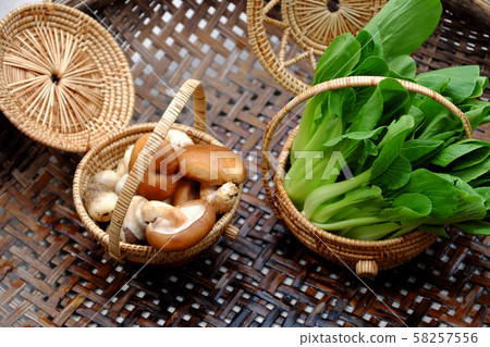 Raw materials vegans, fresh green bok choy and mushroom Raw materials vegans, fresh green bok choy and mushroom 58257556