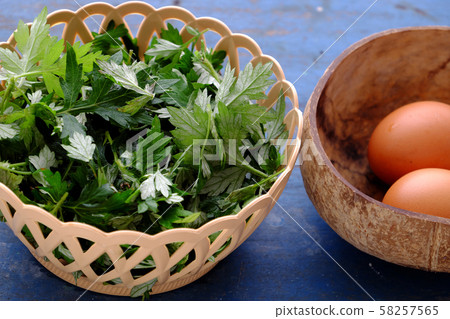 Raw materials fried egg with mugwort leaves Raw materials fried egg with mugwort leaves 58257565