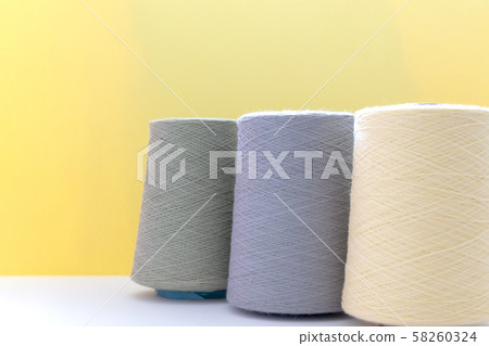 Pastel color bobbins of wool yarn for hand and Pastel color bobbins of wool yarn for hand and 58260324