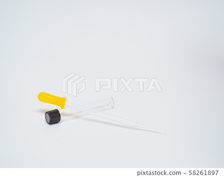 Dropping pipet in white background 58261897