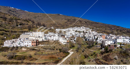 Trevelez in La Alpujarra Granadina, Sierra Nevada, Spain. Trevelez in La Alpujarra Granadina, Sierra Nevada, Spain. 58263071
