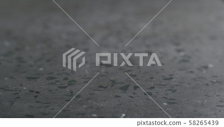 Closeup gray concrete terrazzo countertop Closeup gray concrete terrazzo countertop 58265439