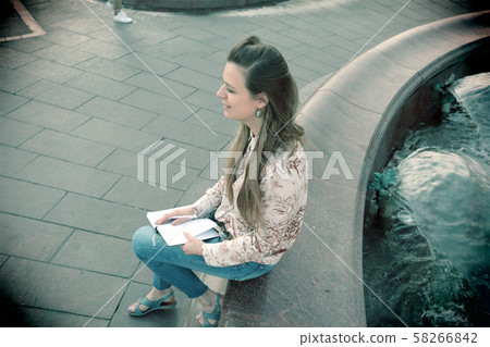 Woman sitting Woman sitting 58266842