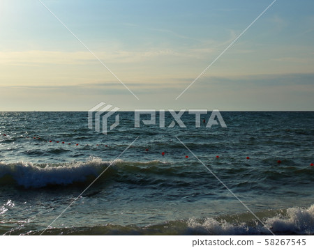 wave sea sand evening texture background 58267545