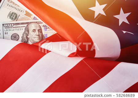 USA national flag and dollar bills USA national flag and dollar bills 58268689