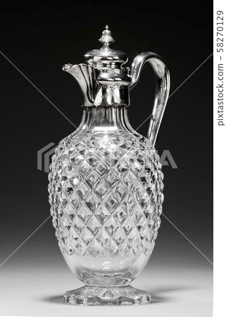 Antique glass decanter or carafe with ornate silver lid 58270129