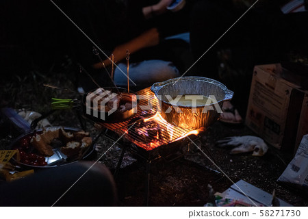 Cheese fondue on the barbecue Cheese fondue on the barbecue 58271730