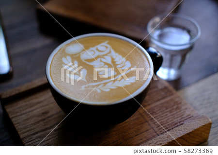 a Cup of Coffee. Menu Drink for Relax on Wood Table Texture and Space for your text. Lifestyle Concept Cafe Design Background. a Cup of Coffee. Menu Drink for Relax on Wood Table Texture and Space for your text. Lifestyle Concept Cafe Design Background. 58273369